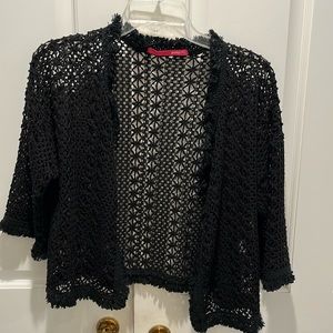 Ladies, black “cardigan”. Guessing size medium.